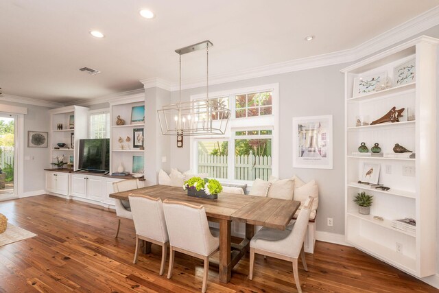 106 Admirals Ln, Key West, FL 33040 - dining room featuring crown molding, wood finished floors, a chandelier, recessed lighting, and baseboards