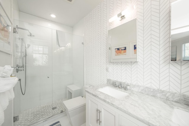 106 Admirals Ln, Key West, FL 33040 - full bath with a stall shower, wallpapered walls, toilet, vanity, and recessed lighting