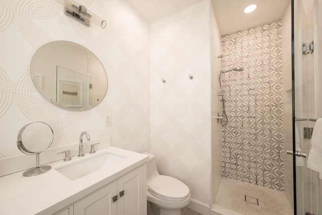 106 Admirals Ln, Key West, FL 33040 - full bath with a shower stall, toilet, vanity, recessed lighting, and wallpapered walls