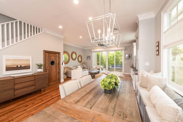 106 Admirals Ln, Key West, FL 33040 - dining area with wood-type flooring, a chandelier, recessed lighting, and ornamental molding