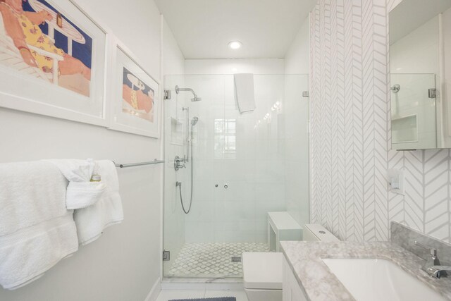 106 Admirals Ln, Key West, FL 33040 - bathroom featuring a stall shower, toilet, recessed lighting, and vanity