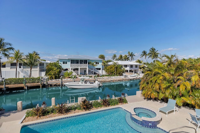 444 Calle De Luna, Marathon, FL 33050 - view of pool featuring stairs, a pool with connected hot tub, and a water view