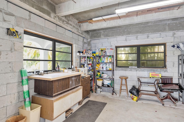 444 Calle De Luna, Marathon, FL 33050 - miscellaneous room featuring unfinished concrete flooring, a wealth of natural light, and concrete block wall