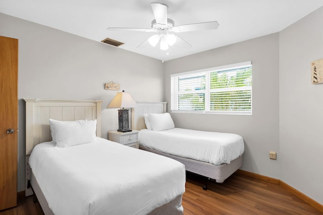 444 Calle De Luna, Marathon, FL 33050 - bedroom with wood finished floors, visible vents, a ceiling fan, and baseboards