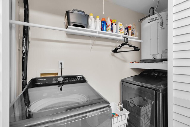 31135 Hollerich Dr, Big Pine, FL 33043 - laundry area featuring washing machine and dryer and electric panel