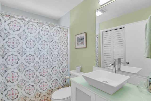 31135 Hollerich Dr, Big Pine, FL 33043 - full bathroom featuring toilet, vanity, and a shower with curtain
