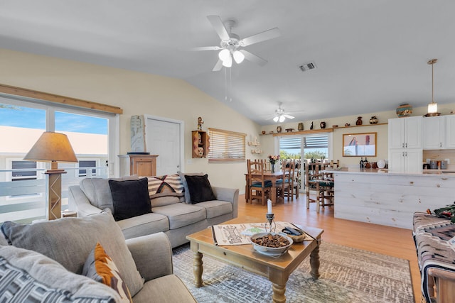 31135 Hollerich Dr, Big Pine, FL 33043 - living room featuring a ceiling fan, light wood finished floors, and lofted ceiling