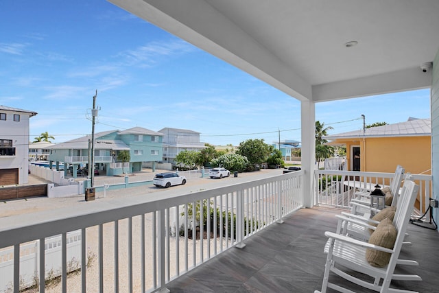 balcony featuring a porch