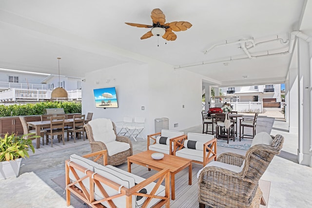 view of patio with an outdoor hangout area and ceiling fan