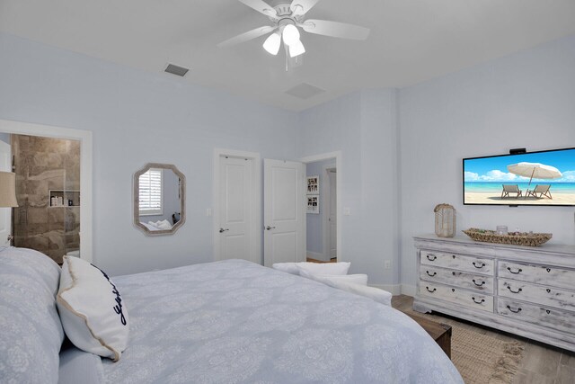 bedroom featuring ceiling fan and wood-type flooring