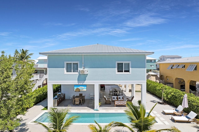 rear view of house featuring a patio area