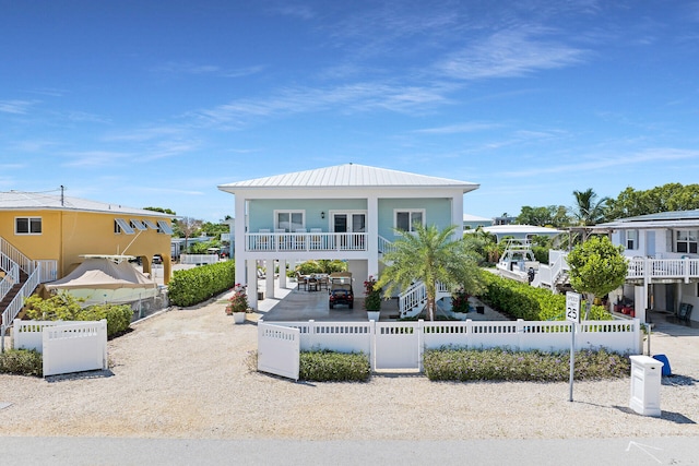 view of front of home featuring a balcony