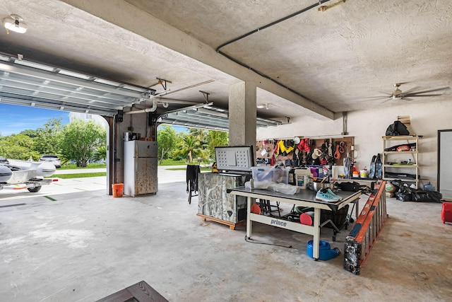 garage featuring freestanding refrigerator