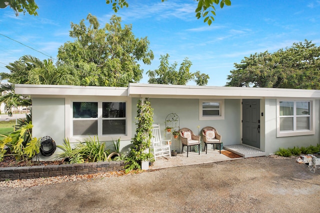 single story home with a patio area