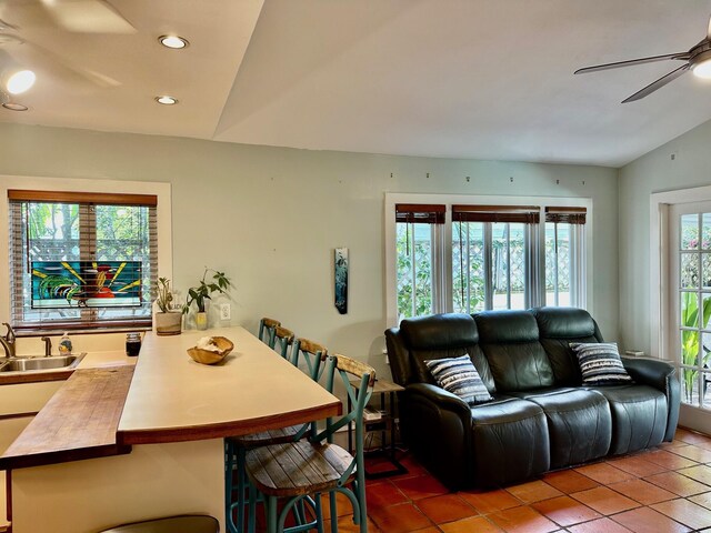 1122 Margaret St, Key West, FL 33040 - living room featuring a ceiling fan, tile patterned flooring, recessed lighting, and lofted ceiling