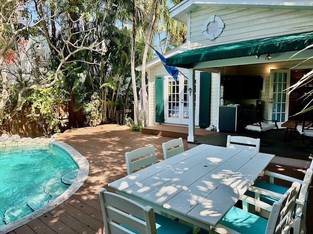 1122 Margaret St, Key West, FL 33040 - outdoor pool featuring french doors, a deck, and outdoor dining space