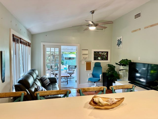 1122 Margaret St, Key West, FL 33040 - living room with visible vents, baseboards, ceiling fan, wood finished floors, and vaulted ceiling
