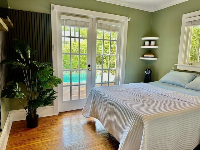 1122 Margaret St, Key West, FL 33040 - bedroom featuring french doors, access to exterior, ornamental molding, and wood finished floors