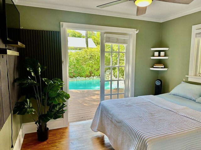 1122 Margaret St, Key West, FL 33040 - bedroom featuring ornamental molding, access to outside, wood finished floors, and a ceiling fan