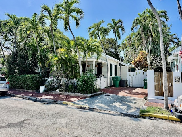 1122 Margaret St, Key West, FL 33040 - view of front of house with central air condition unit and fence