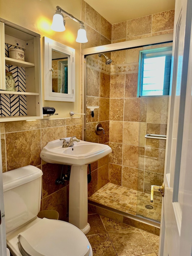 1122 Margaret St, Key West, FL 33040 - bathroom featuring a shower stall, tile walls, and toilet