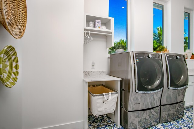 laundry area featuring separate washer and dryer