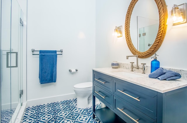 bathroom with vanity, an enclosed shower, tile patterned floors, and toilet