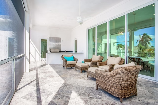 sunroom / solarium with ceiling fan