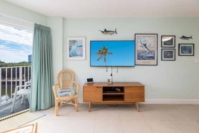 sitting room with light tile patterned floors