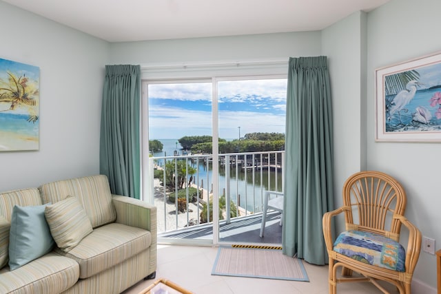 living area featuring a water view