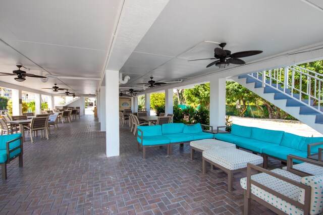 view of patio / terrace with outdoor lounge area and ceiling fan