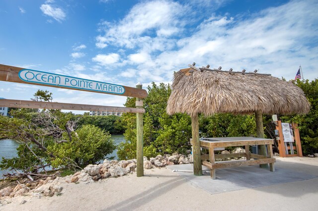 view of home's community featuring a gazebo and a water view