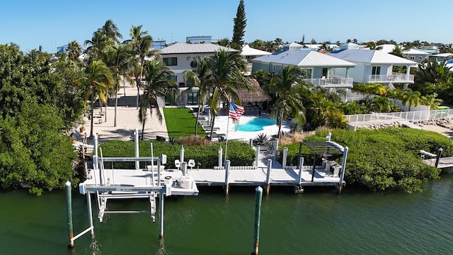 view of dock featuring a water view and boat lift