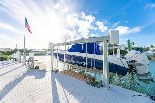 dock area featuring a water view and boat lift