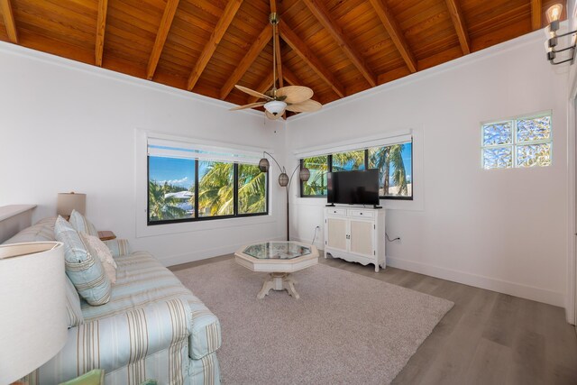 living room with baseboards, a ceiling fan, wooden ceiling, wood finished floors, and vaulted ceiling with beams