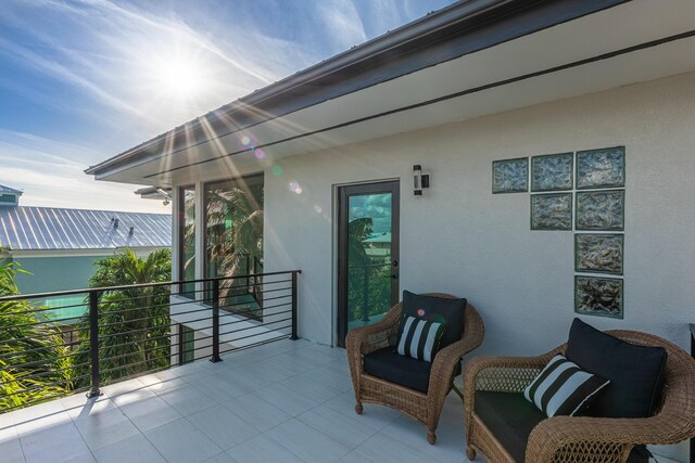 view of patio / terrace with a balcony