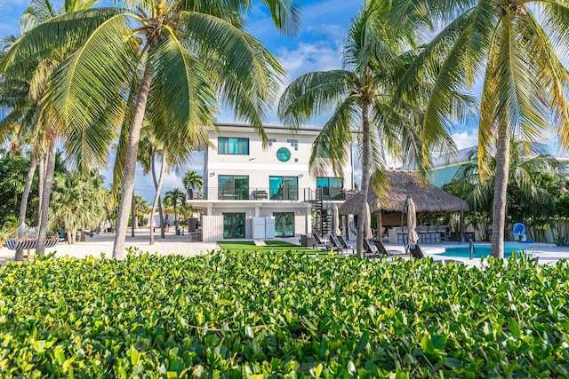 view of building exterior with an outdoor pool