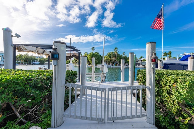 view of gate with a water view