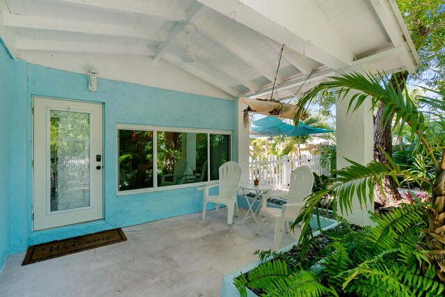 view of patio / terrace featuring fence