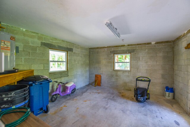 misc room featuring water heater