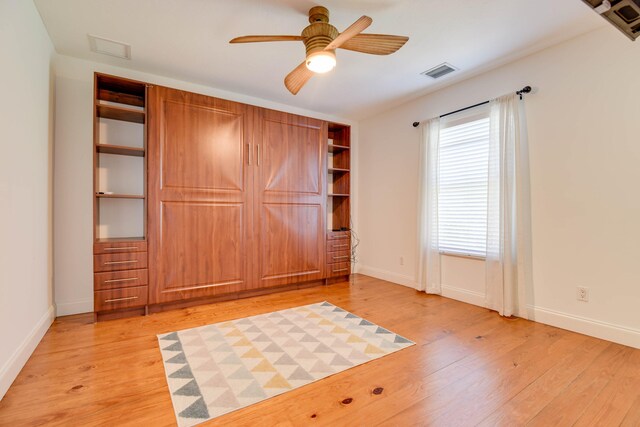 interior space featuring ceiling fan and light hardwood / wood-style flooring