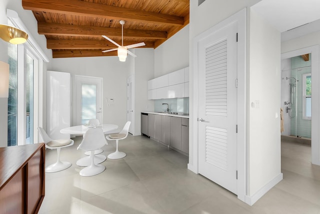 dining area with wood ceiling and beam ceiling