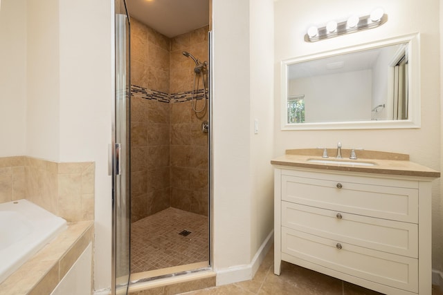 bathroom with vanity, tile patterned floors, and independent shower and bath