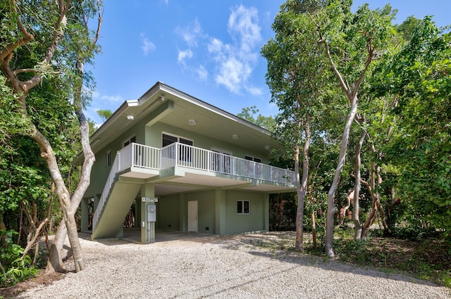 view of front of property with a carport