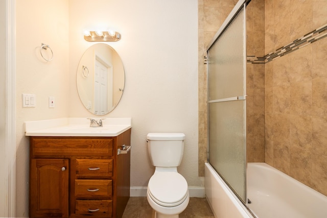 full bathroom featuring bath / shower combo with glass door, vanity, and toilet