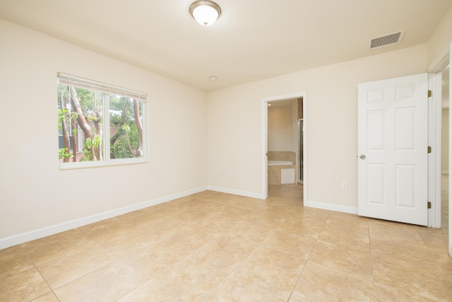 view of tiled spare room