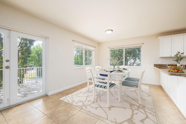 dining room featuring light tile patterned floors