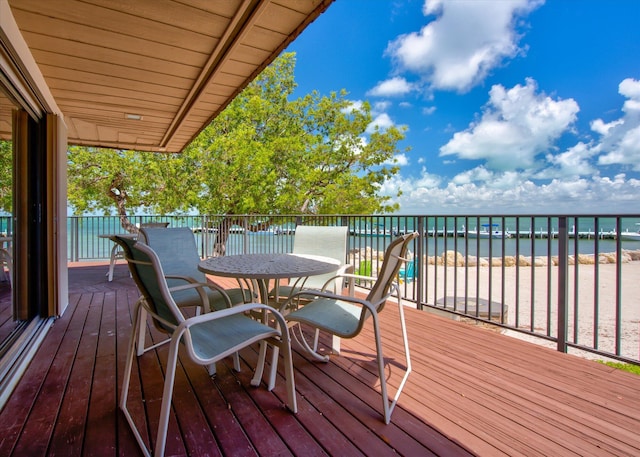 deck featuring a water view