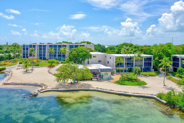 drone / aerial view with a water view