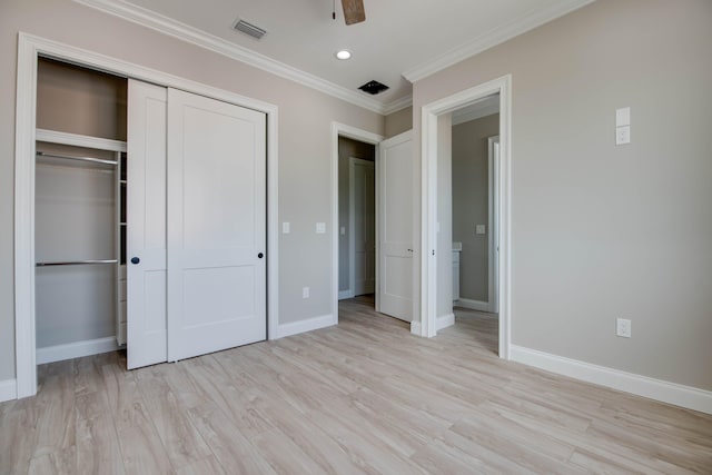 23066 Tarpon Ln, Cudjoe, FL 33042 - unfurnished bedroom featuring light wood-style floors, a closet, baseboards, ornamental molding, and recessed lighting